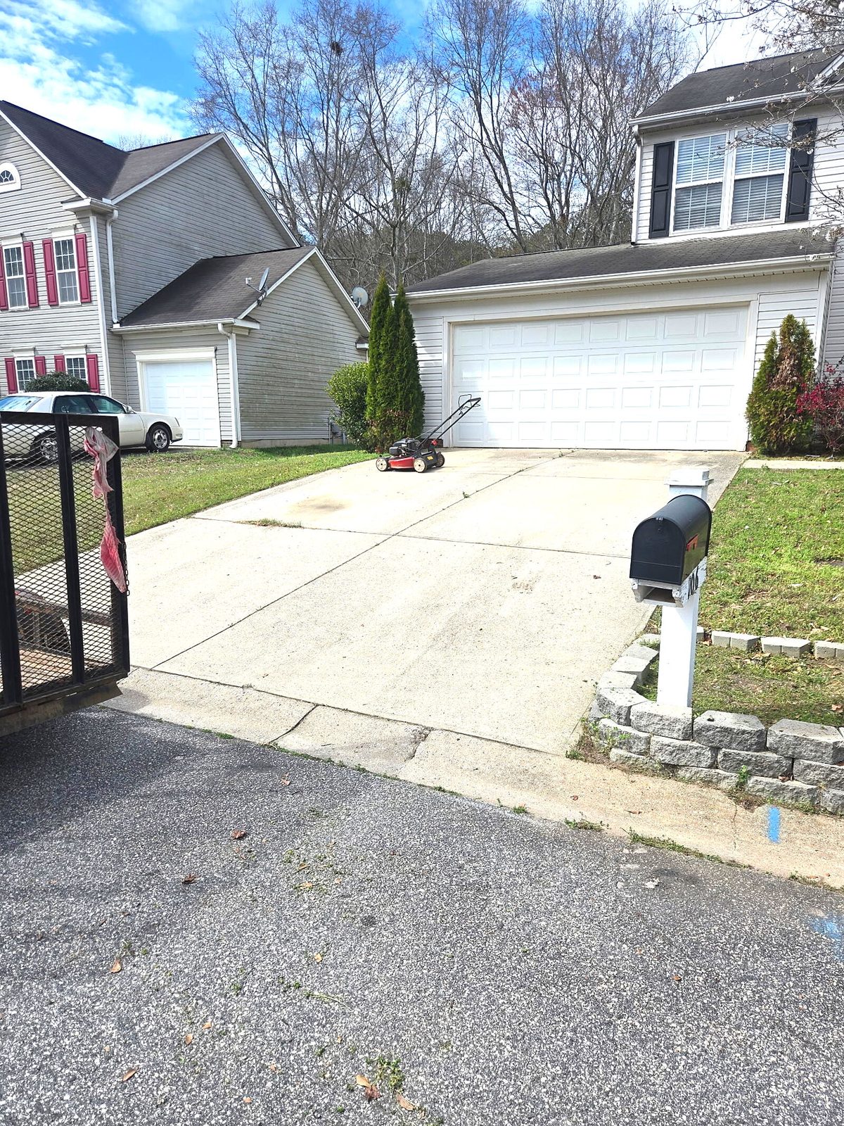 LawnSkapers mower on driveway during a routine cut
